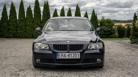 A car on a driveway, cleaned and ready to hand back.
